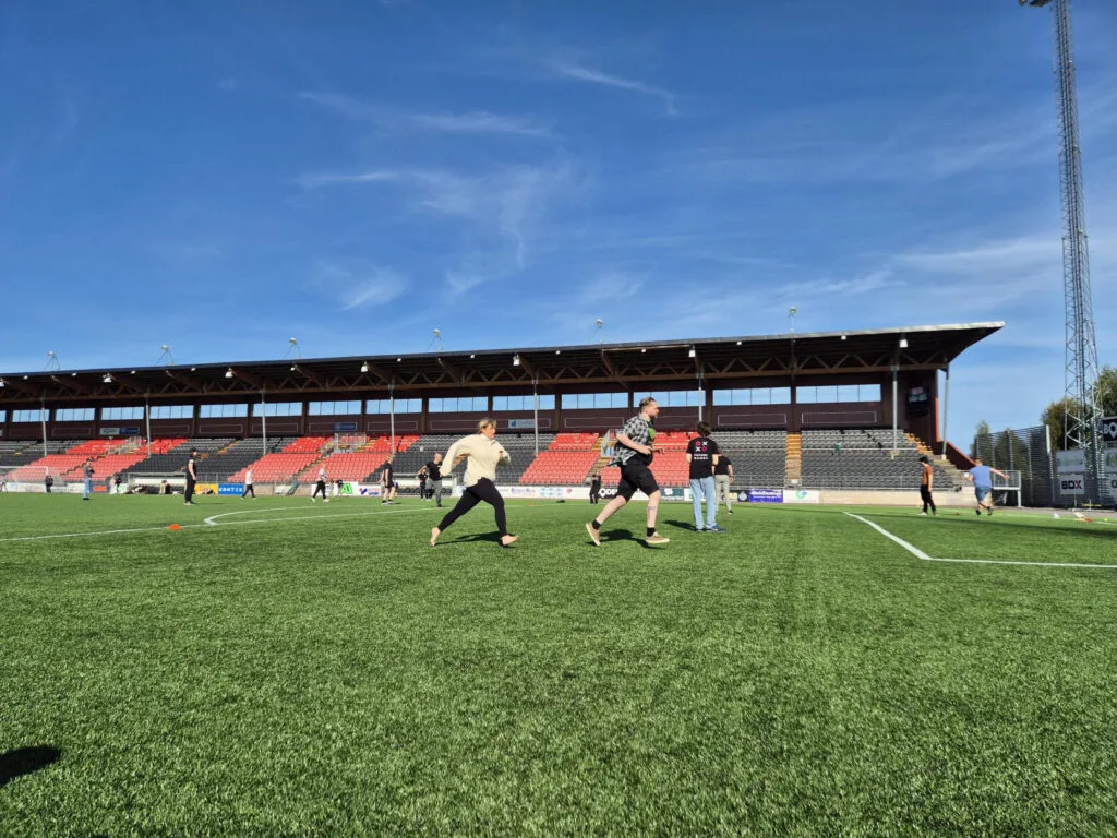 Futuregames students playing "brännboll" at stadium in Boden.