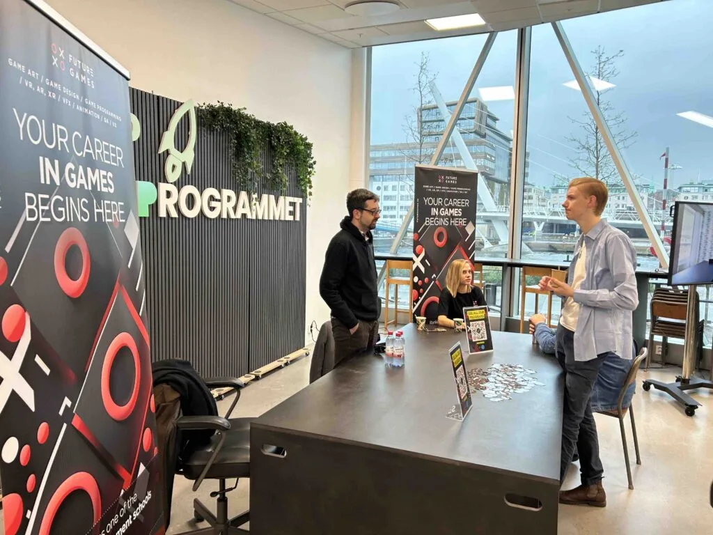 Futuregames students representing the school at a fair in Malmö.