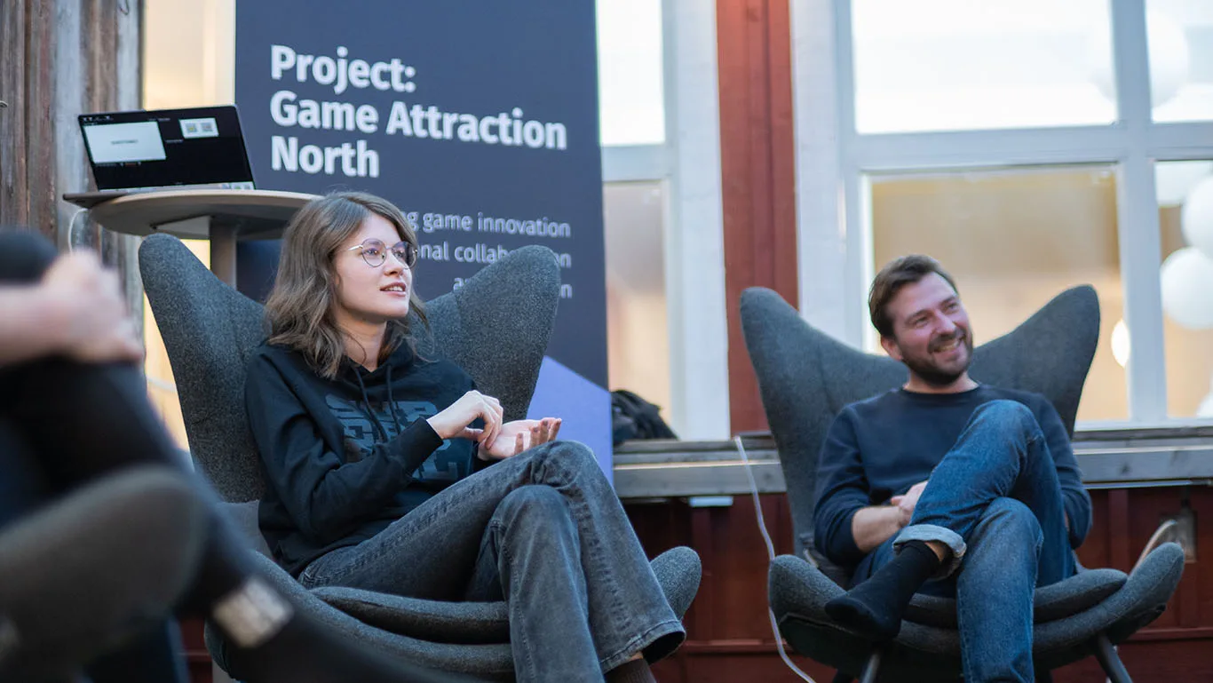 Vladislav Perge, Community Manager for Clash of Clans, and Lavinia Macovei, Community Manager for Hay Day at the Fireside Chat with Supercell in Skellefteå.