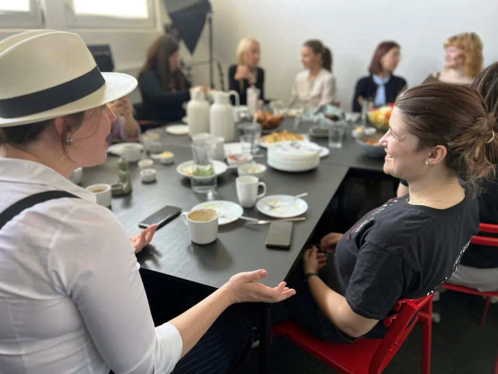 Participators at WIG Ambassadors conversating and having breakfast.  breakfast.